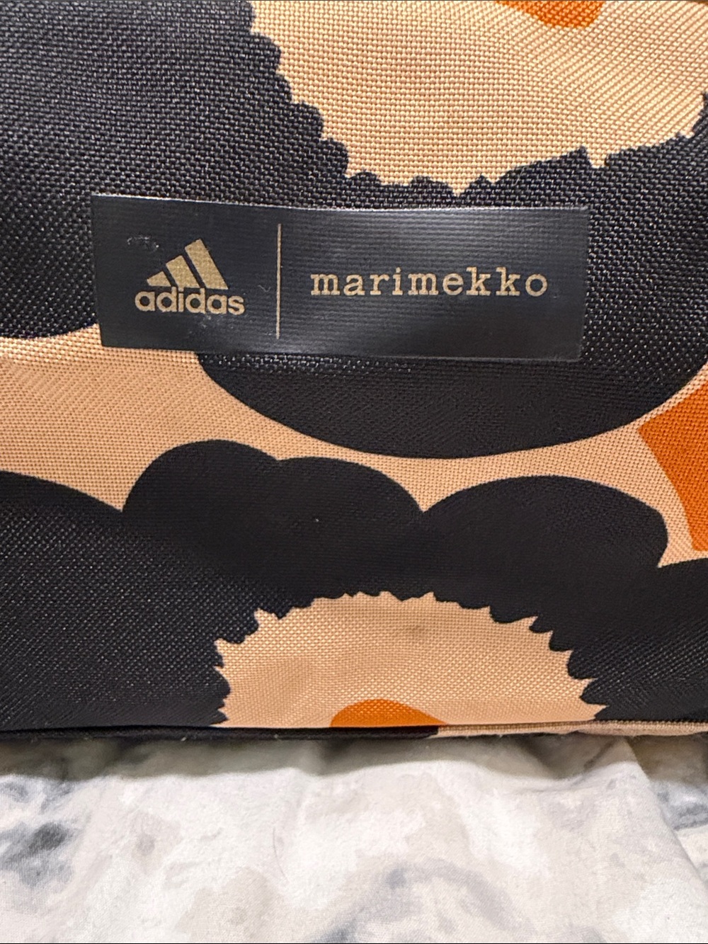 Adidas x Marimekko Printed Duffel Bag in Beige & Black - Picture 2 of 8